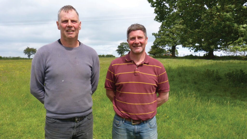 Graham and Michael Rutherford in a field