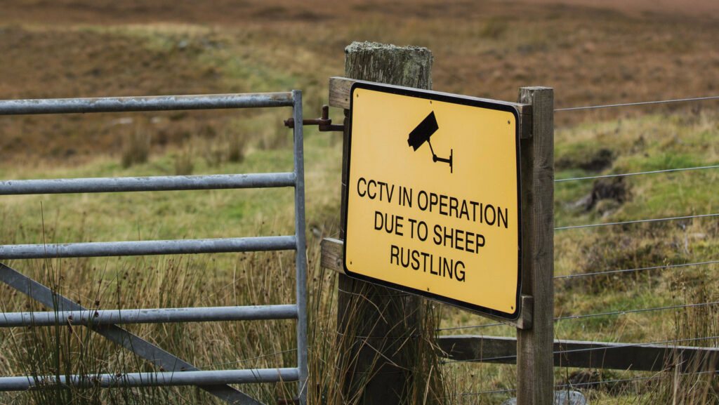 Sign warning of CCTV operation due to sheep rustling