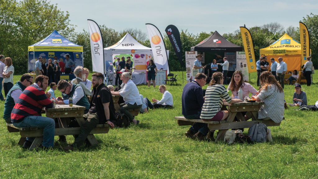 Visitors sitting at tables for lunch