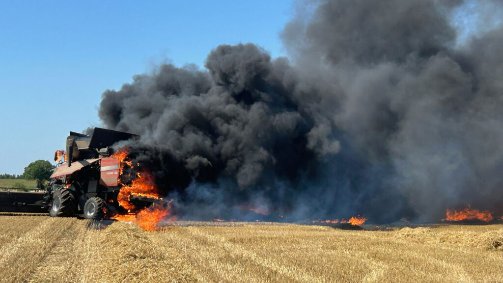 Smoke billowing from the combine © Jonathan Edwards