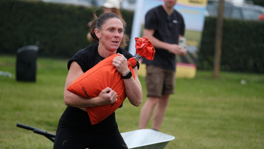 Jennie Woodcock holding a weighted bag