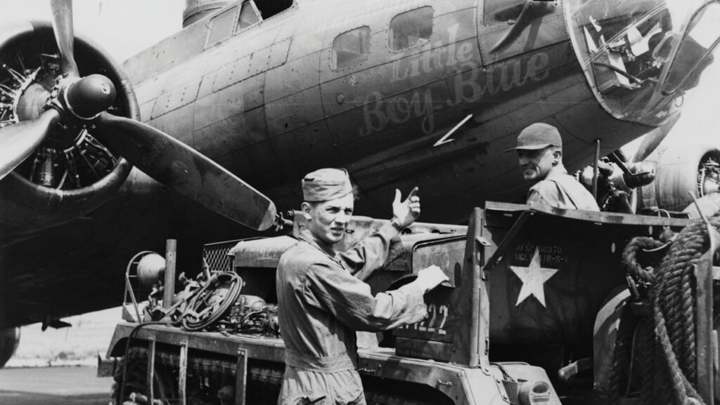 Second World War ground crew with US bomber