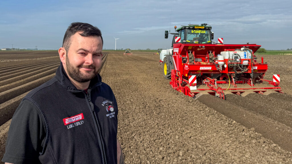 Potato grower Luke Edgley in field with multi-planter