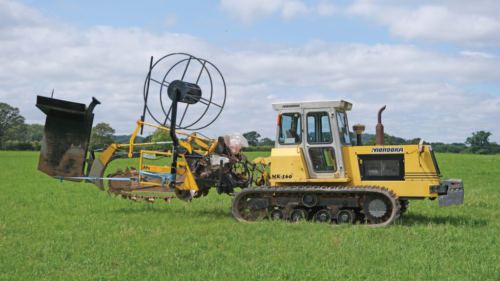 AFT100 trencher and Morooka crawler in a field