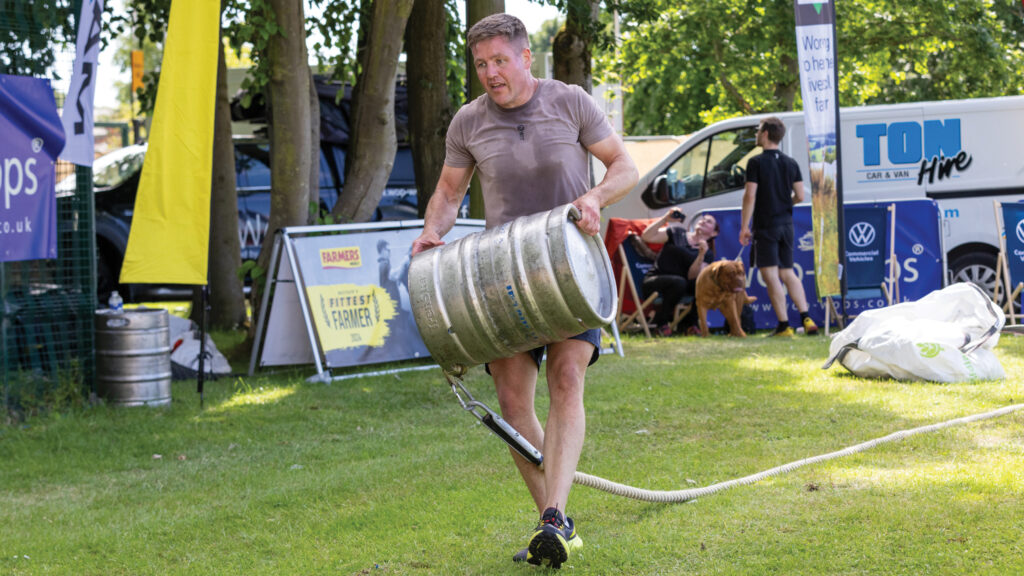 Neil Blyth carrying a barrel