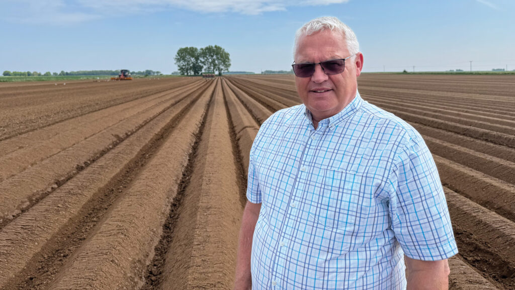 Potato grower Neil Sharpe in field