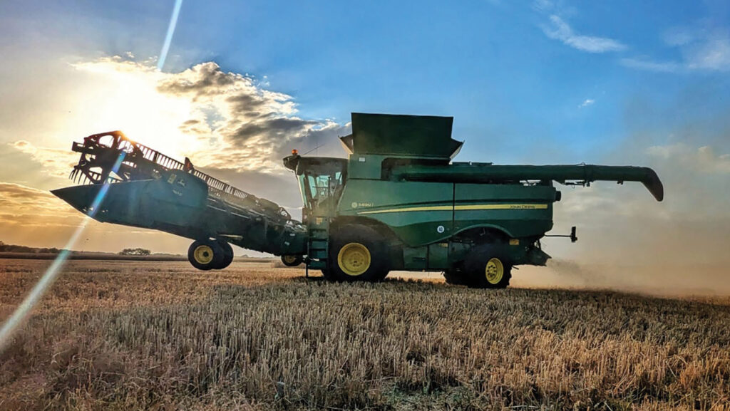 Combine harvester in a field at River Eden Farms