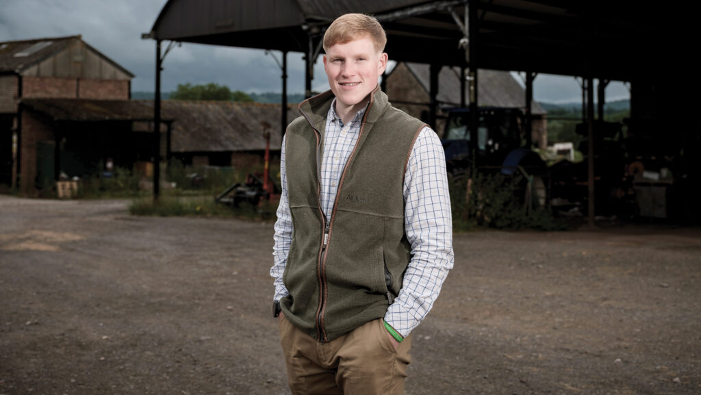 Tom York standing in a farm yard