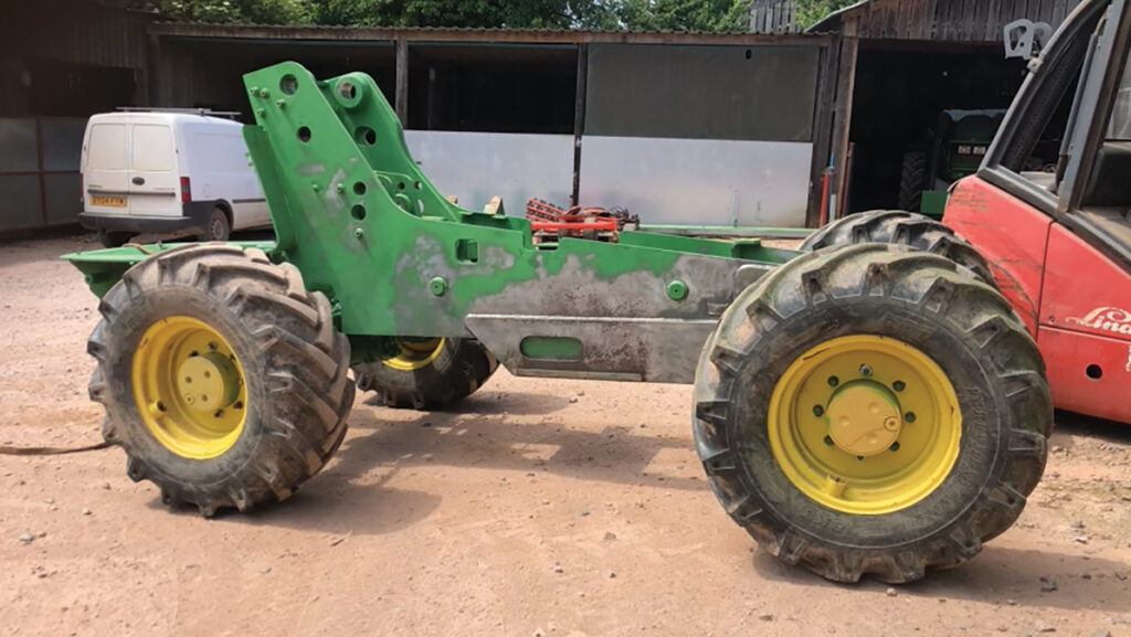 Chassis stripped down on a farm yard