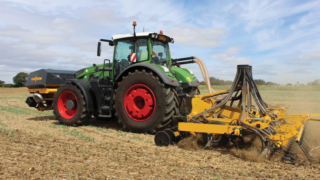 Tractor pulling a drill