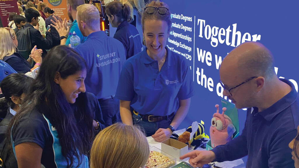  People at the Harper Adams stand at New Scientist Live's exhibition in 2023