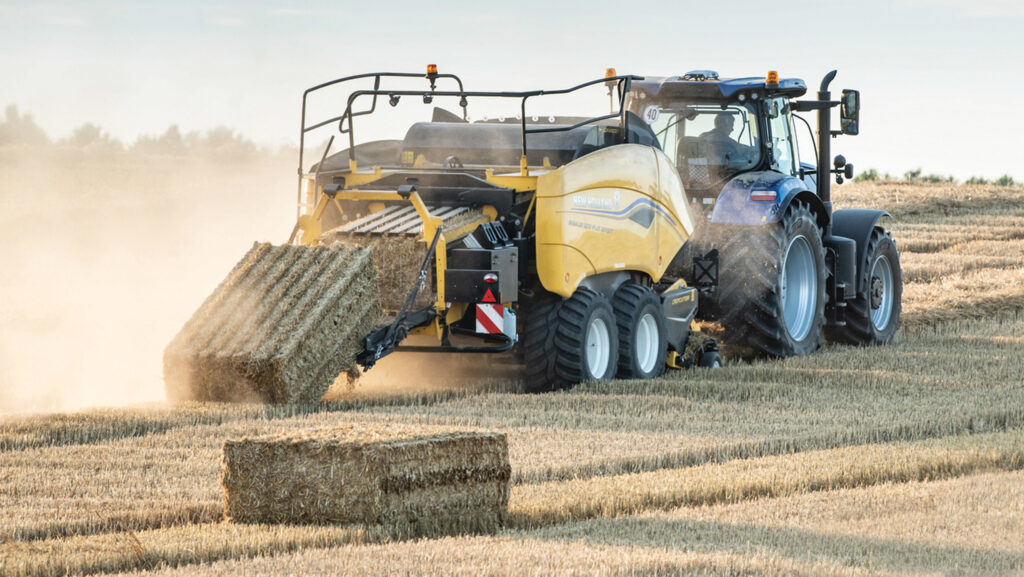 Tractor pulling a baler