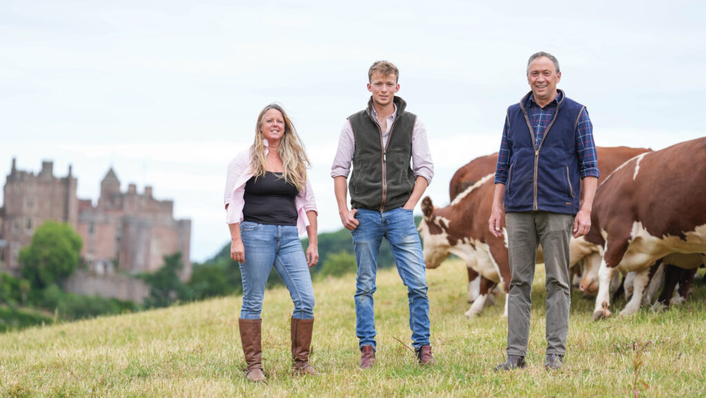 Tracey, Andrew and Robert Speed with cows