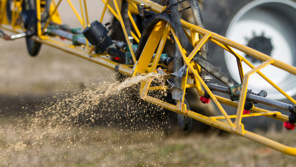 Applying liquid fertiliser to potato land