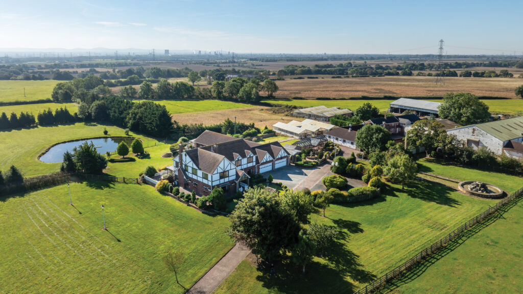 Aerial view of farmland and farm buildings at Springwell Farm