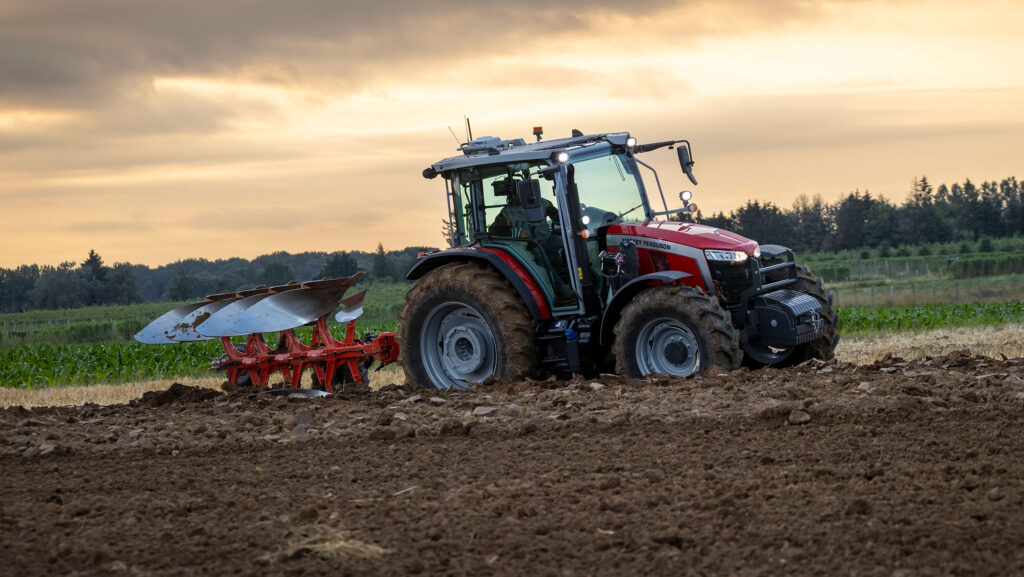 Massey Ferguson 5Mworking with a Kuhn plough