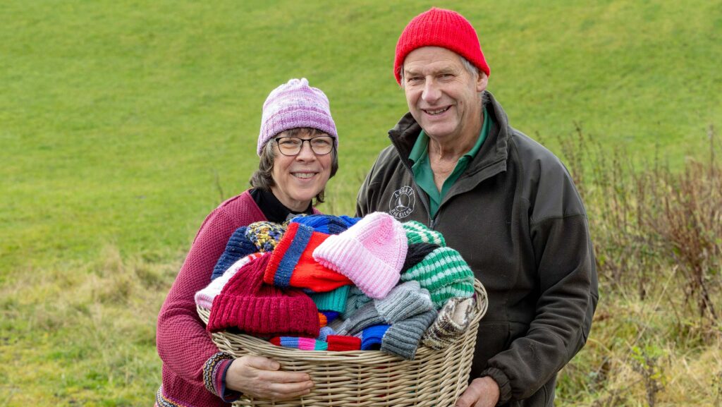 Modelling the hats are St Mary's vicar Nerys Brown and Doune farmer Niall Bowser © Rsabi