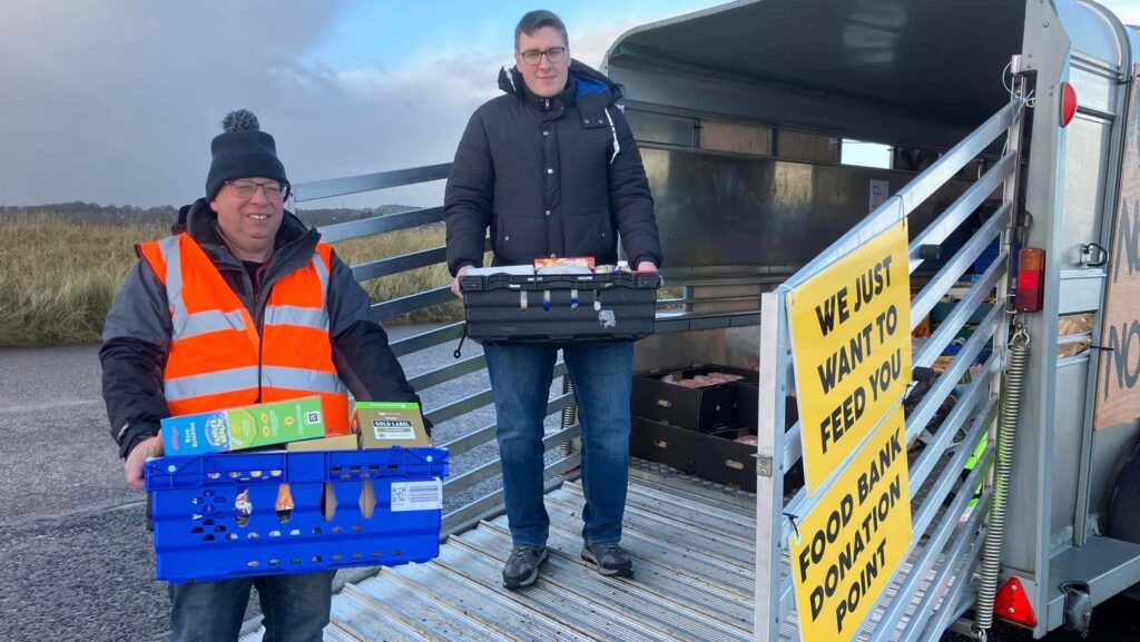 Farmers handle food donations for the local food bank