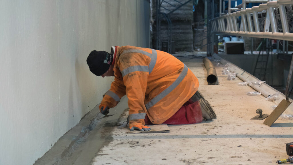 Milking parlour construction worker