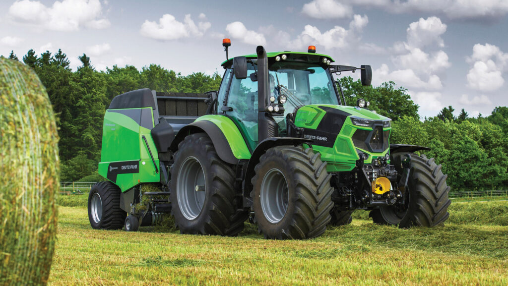 Deutz Fahr 6175 4 TTV stepless drive tractor working in a field of grass