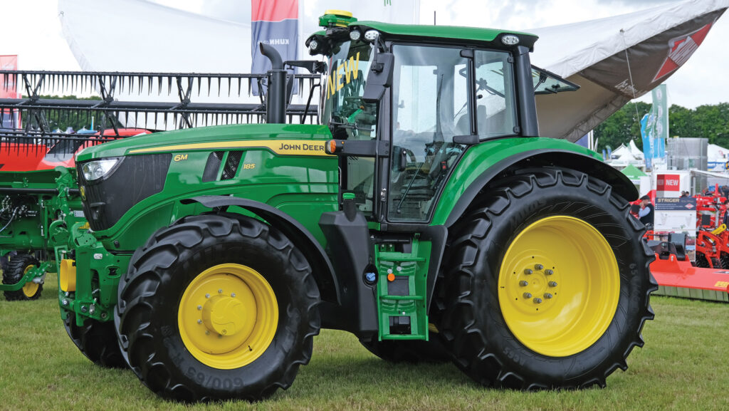 John-Deere 6M 185 parked up on a showground