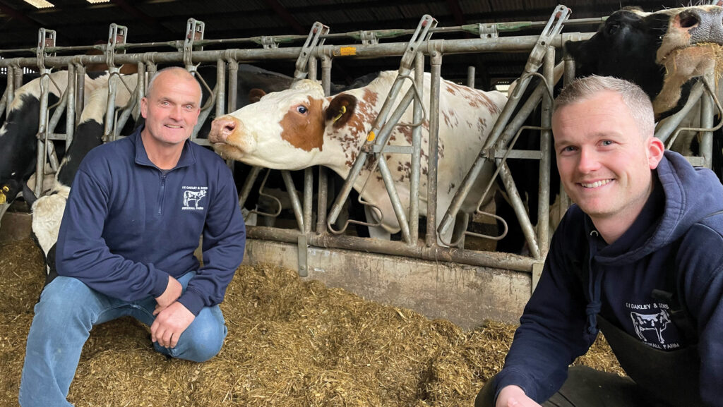 John and Ben Oakley with cows