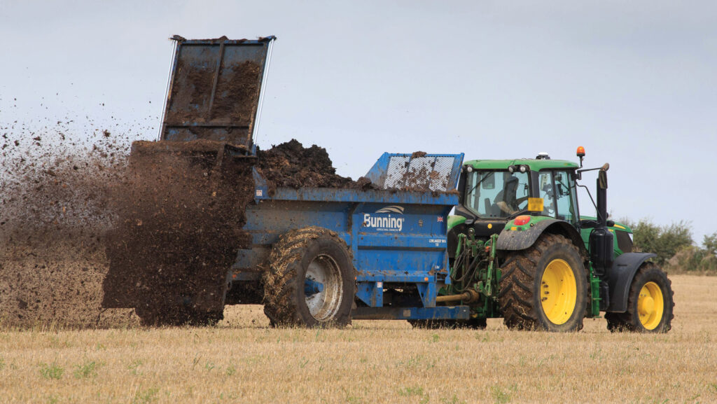 Muckspreading in field