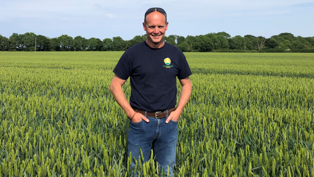 Jonathan Hodgson in flax field