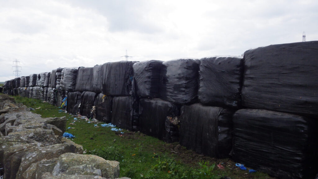 Shot from photo library showing waste disguised in bales © Crown copyright