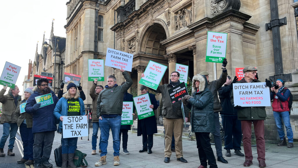 Protesters outside the Oxford Farming Conference