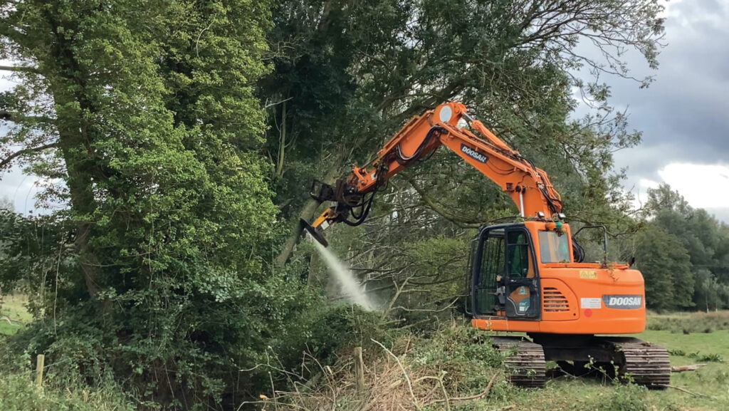 An excavator working in a field