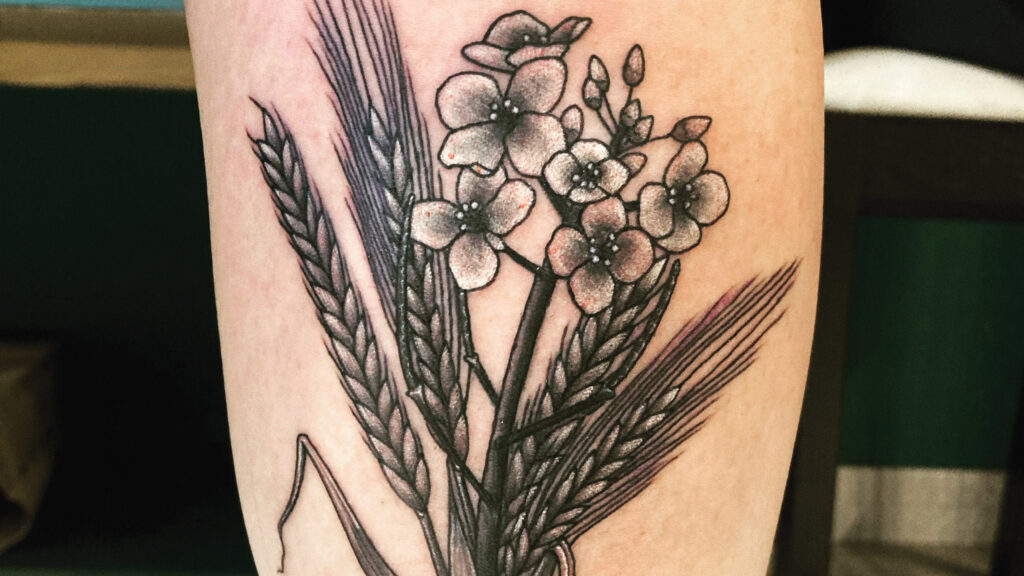 tattoo of wheat and flowers