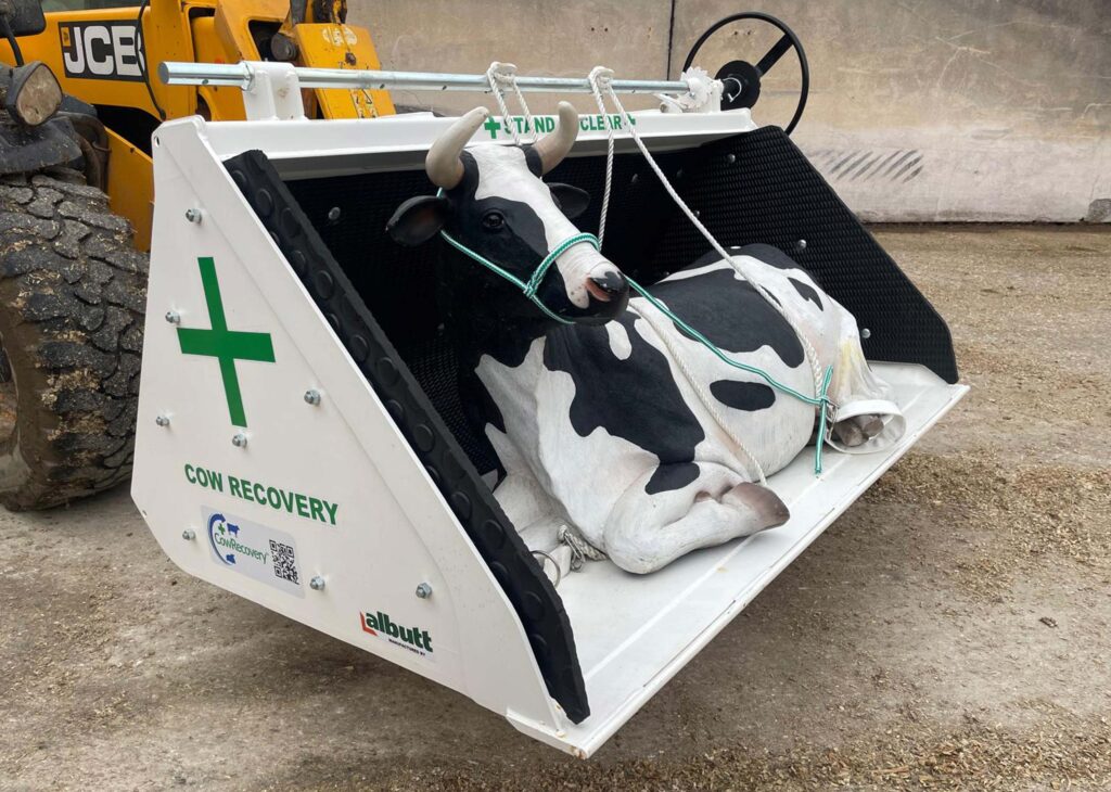 Lifting bucket with full-size model of a cow