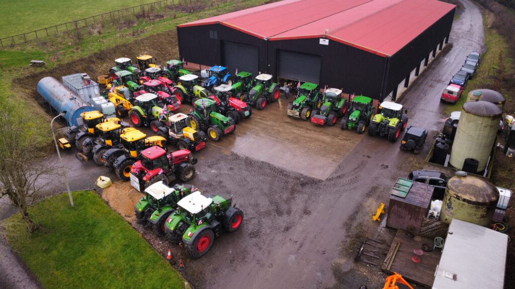 Tractors gathered on a farm prior to protests around inheritance tax in London