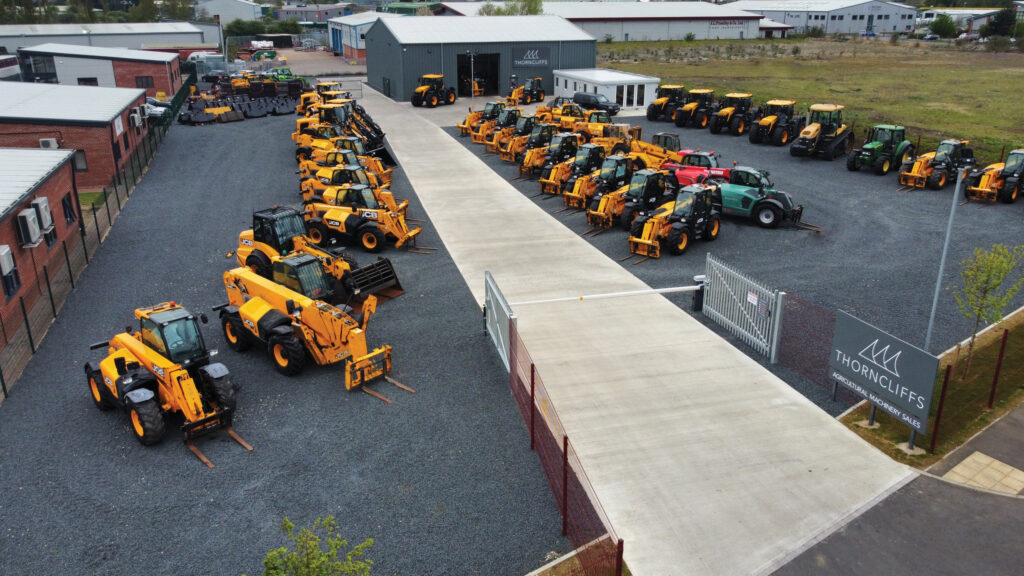 Machinery lined up in a dealer's yard