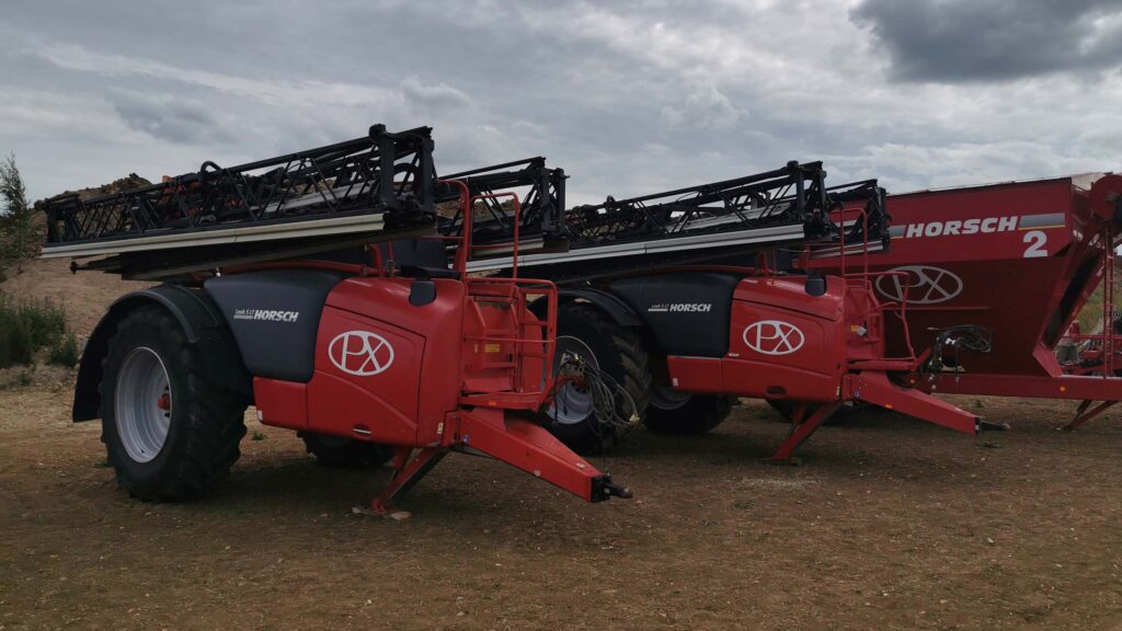 Row of folded sprayers at outdoor open day