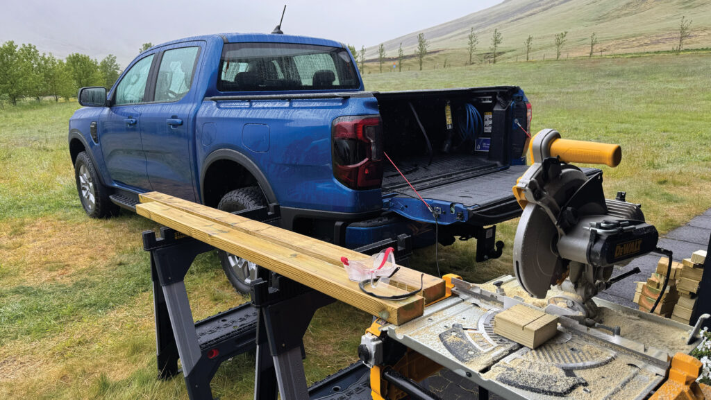 Chop saw being run from pickup in a field