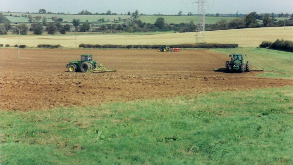Tractors working on field at Thrupp Farms