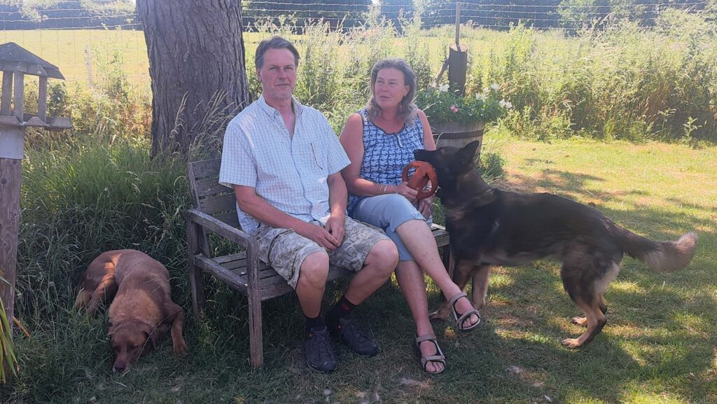 Jon and Judy Homer with their dogs