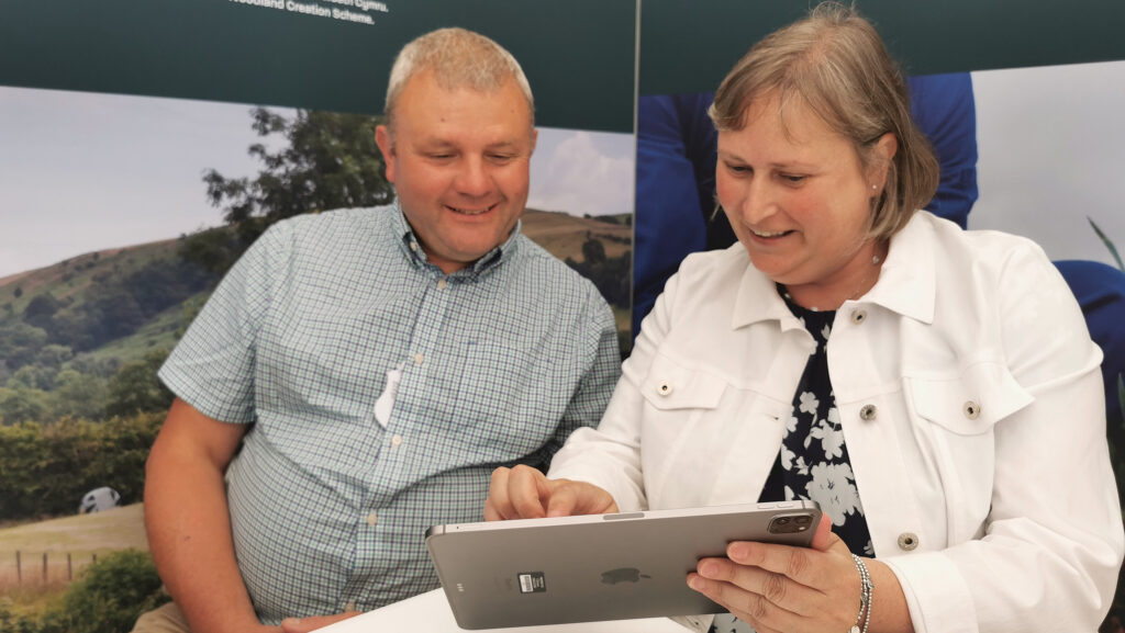 Martin Griffiths inputs farm details into Ready Reckoner with Welsh government official