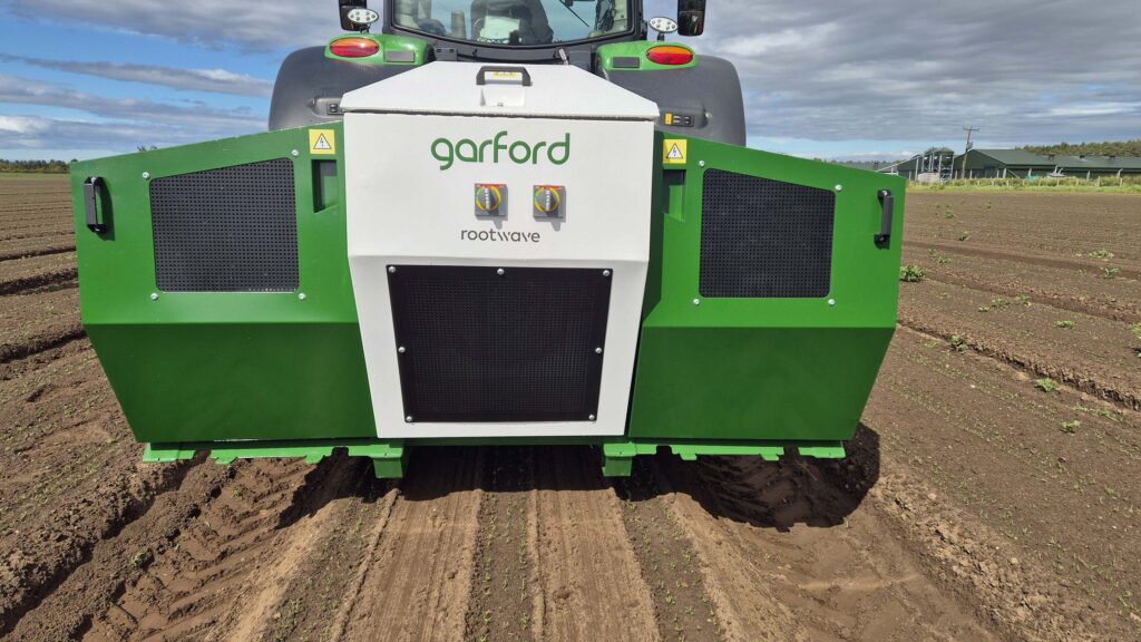 Front view of weeding machine at work