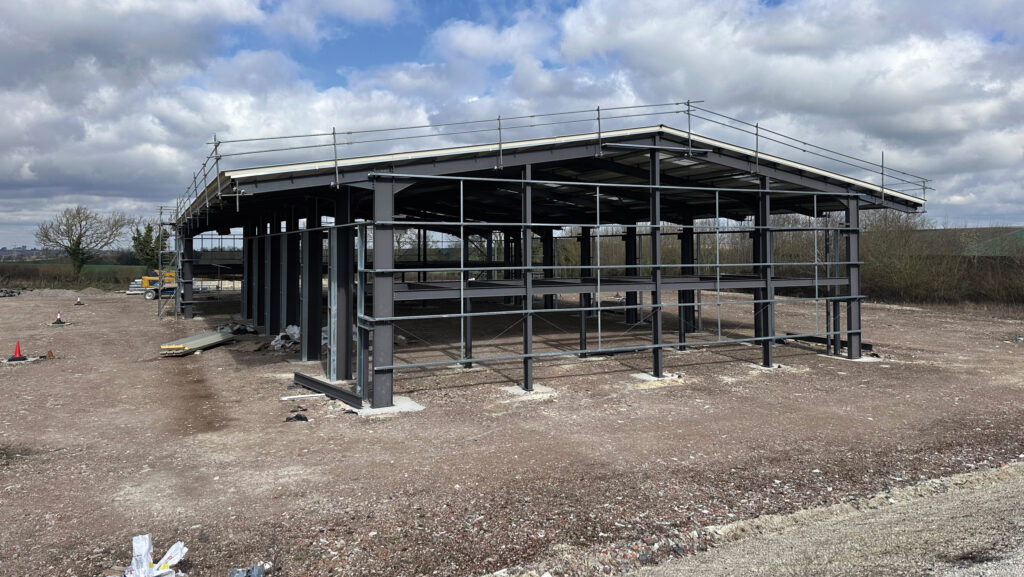 Steel-frame warehouse/depot being built