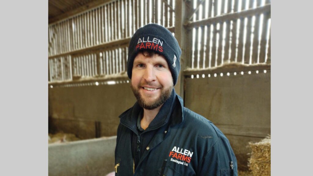 Farmer inside a pig shed