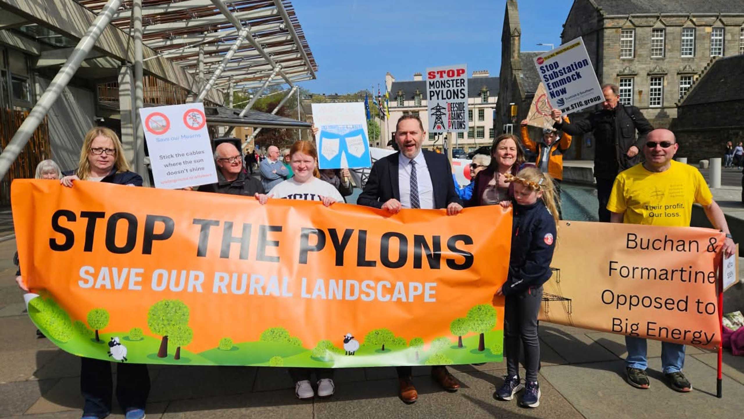 MSP Douglas Lumsden with protestors