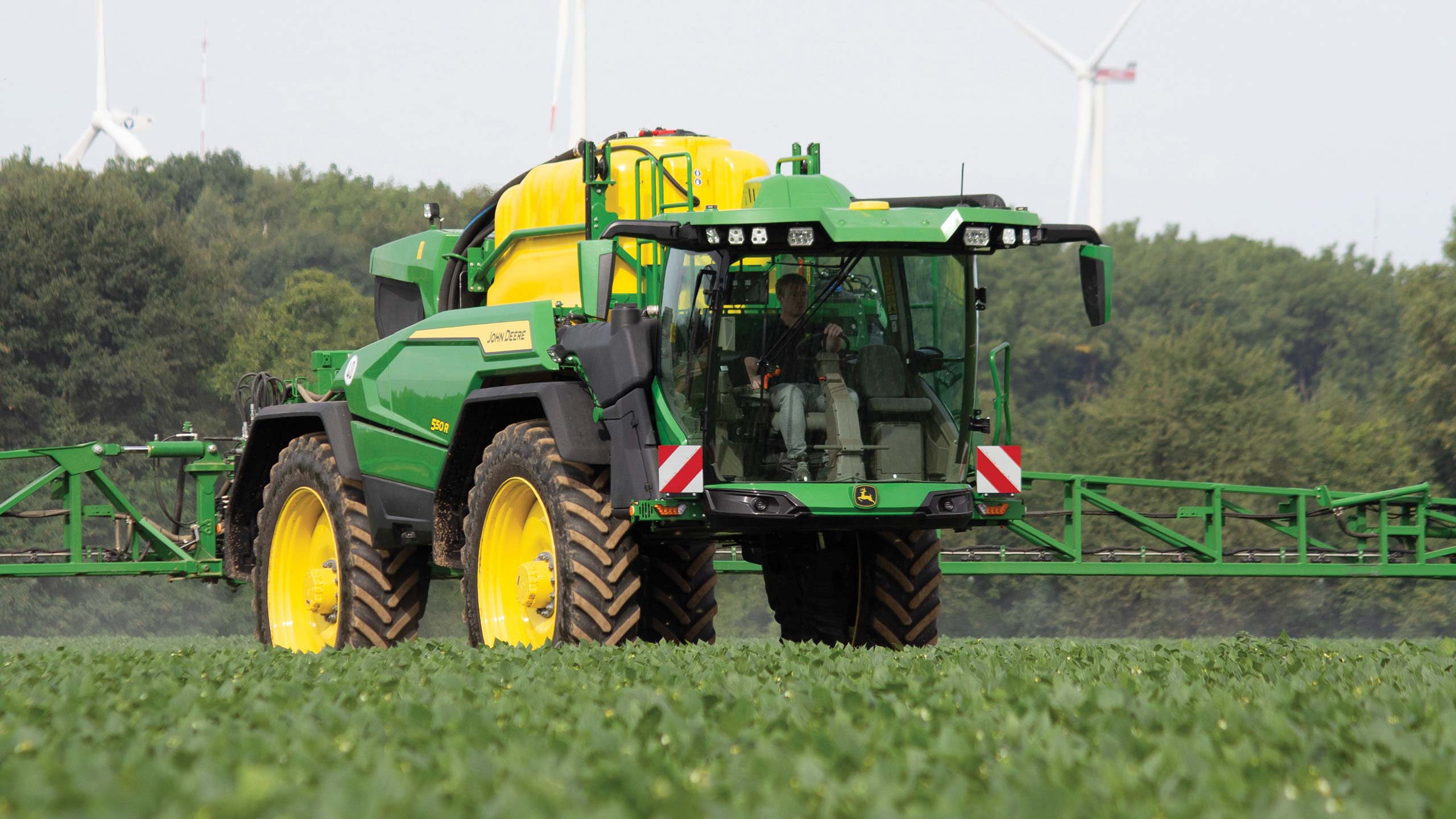 Self-propelled sprayer in a crop