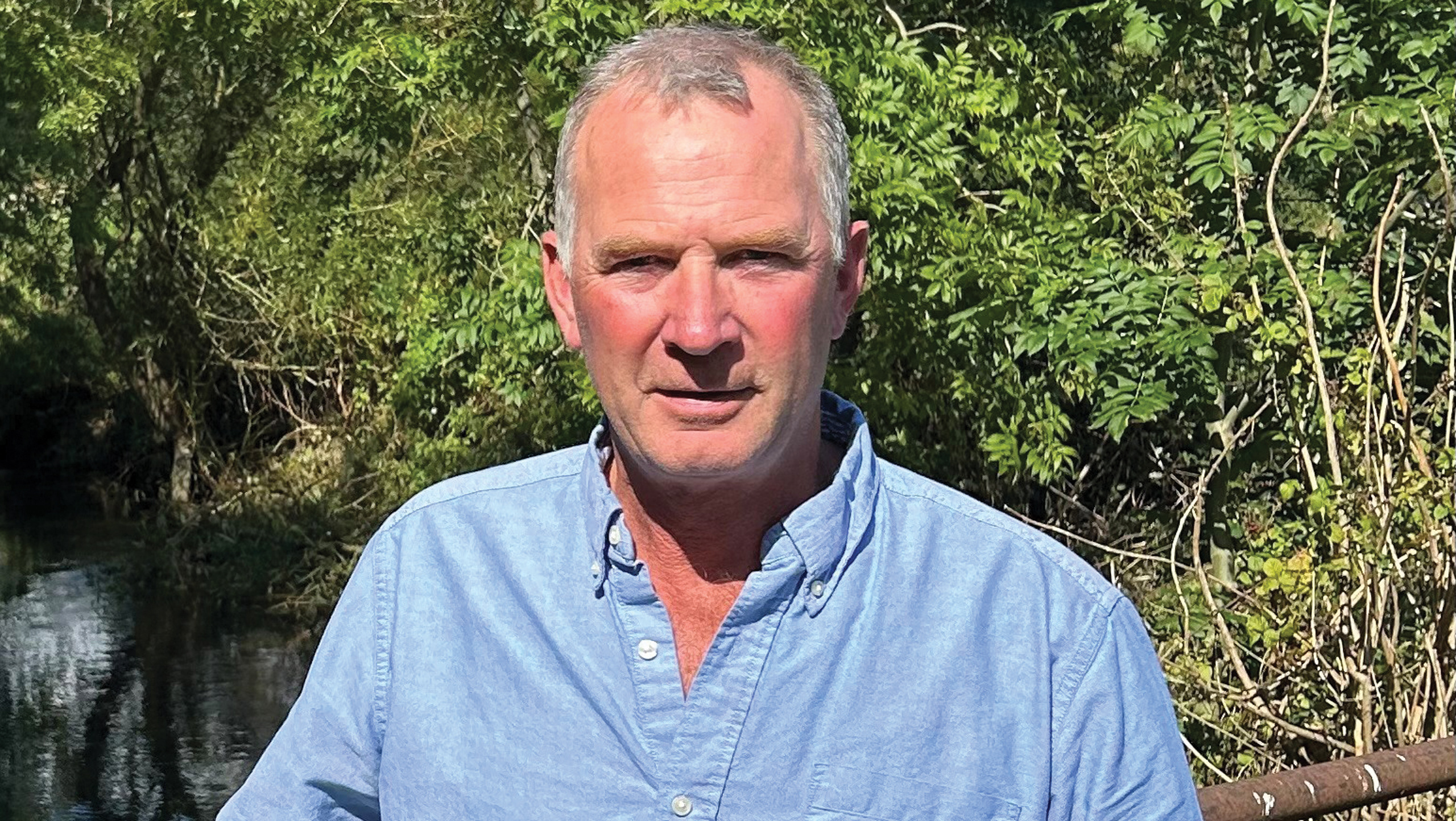 Farmer poses for a photo
