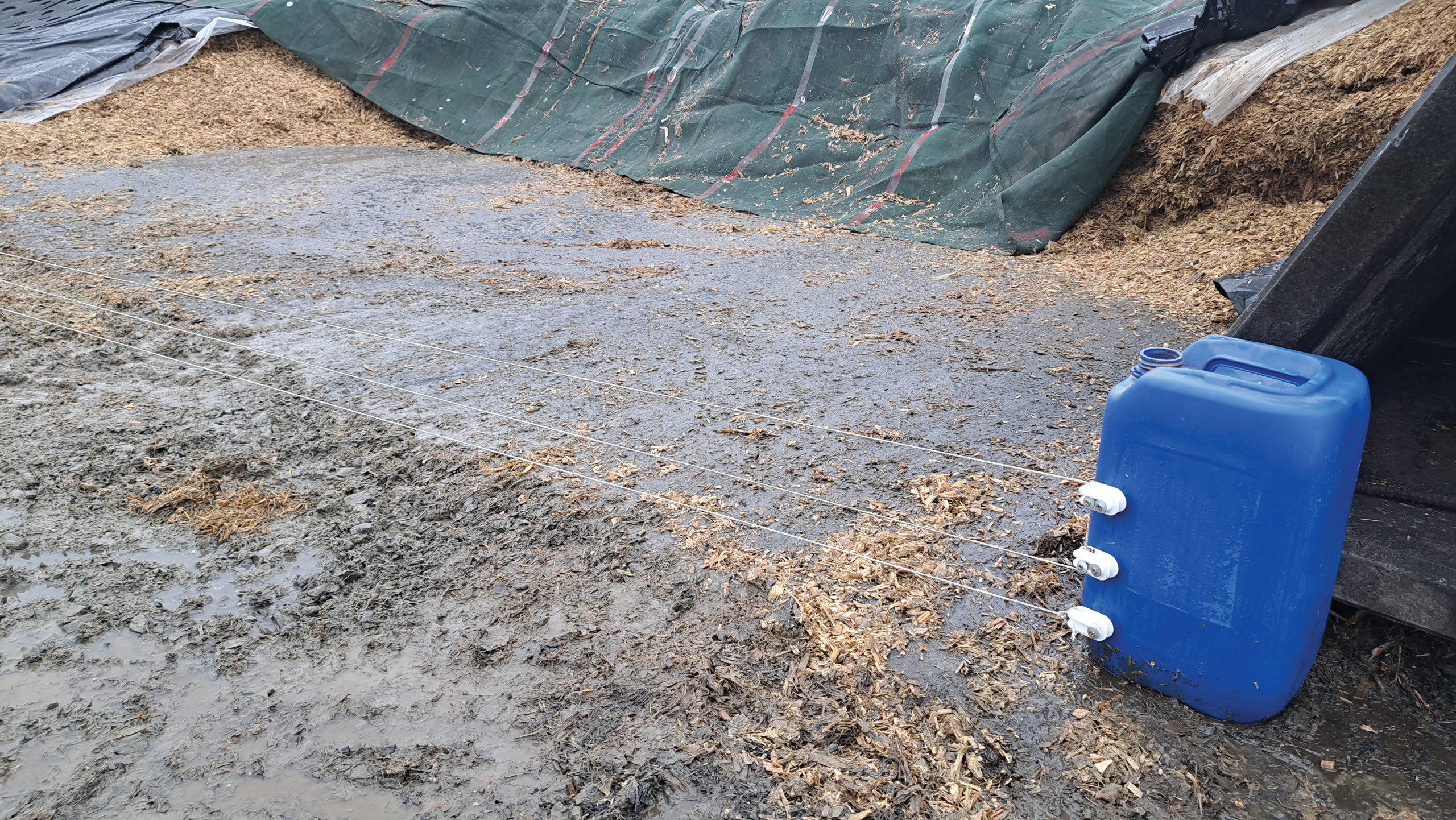 Electric fence in front of maize clamp