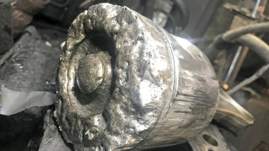Melted piston on Case MX tractor