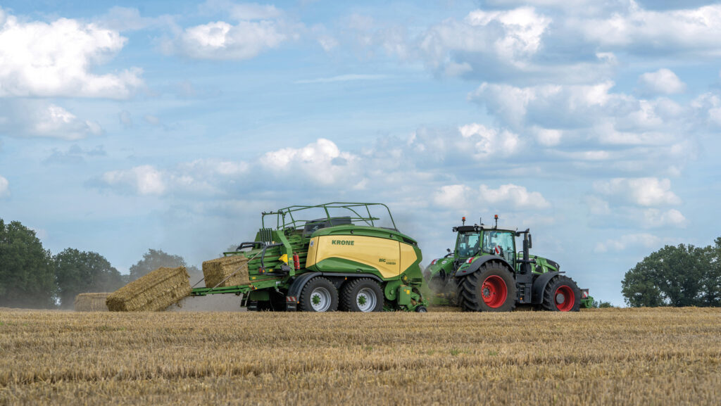 Baler and tractor at work