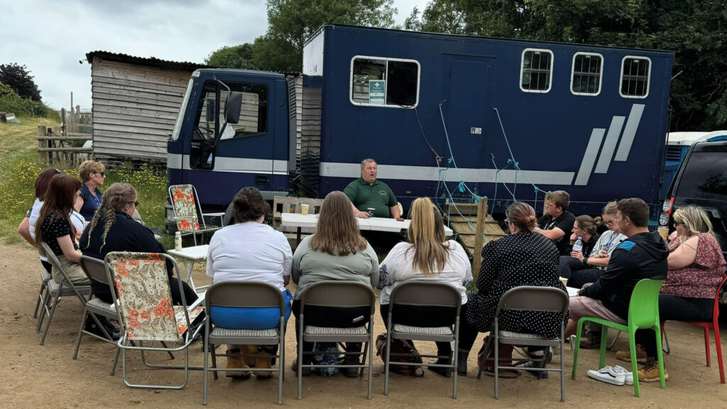 Students in front of lorry